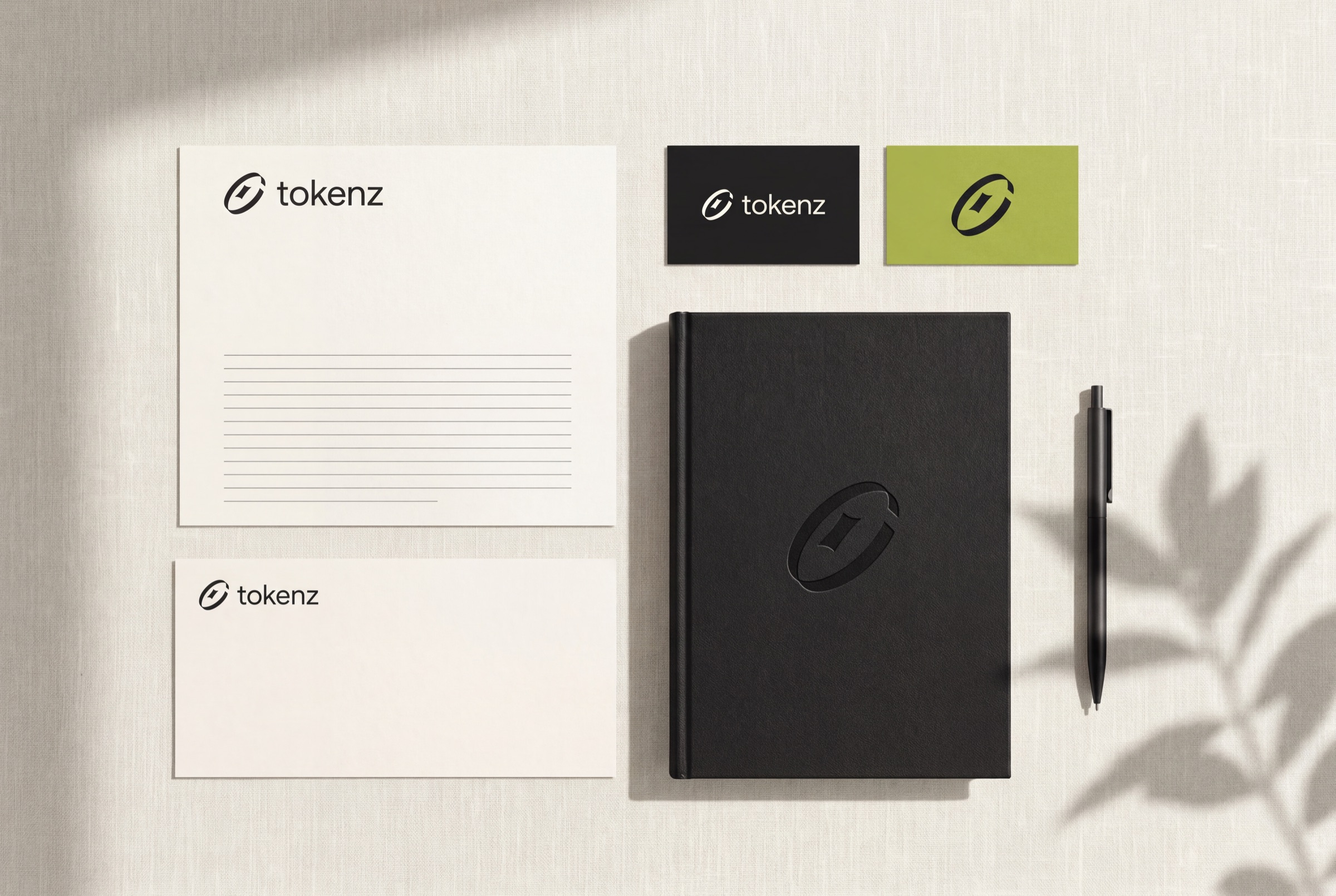 Stationery flat lay with letterhead, cards and notebook